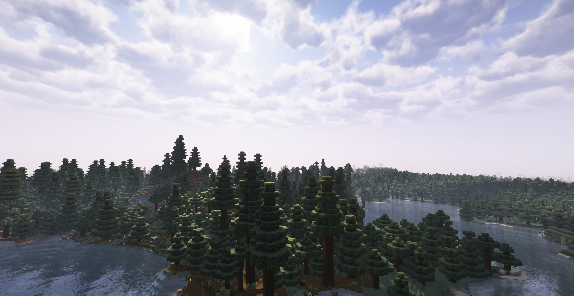 Vue aérienne d’une forêt de pins dans Minecraft avec Luminara Shader